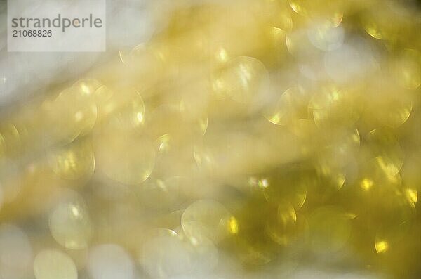 Goldene Bokeh Textur  Unscharfe Textur aus goldenem Glitter für Hintergründe