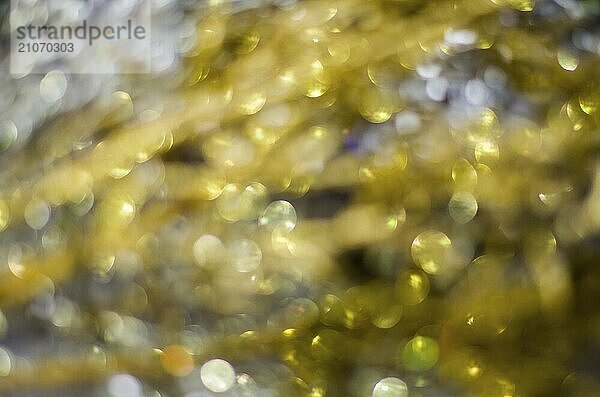 Goldene Bokeh Textur  Unscharfe Textur aus goldenem Glitter für Hintergründe