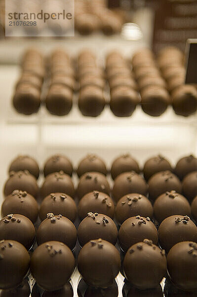 Rows and rows of chocolate truffles.