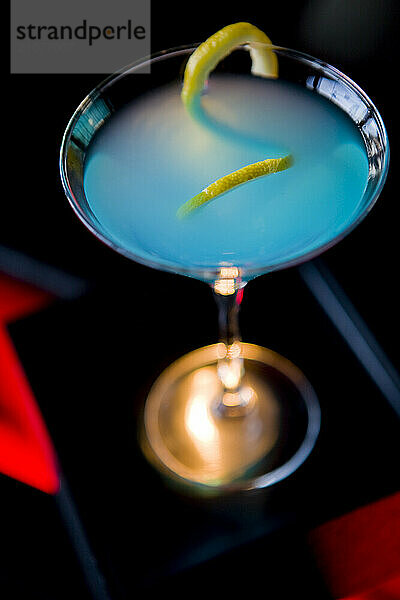 A colorful blue Martini cocktail.