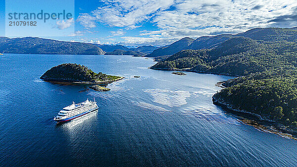 Cruise ship anchoring in Wulaia Bay  Tierra del Fuego  Chile  South America