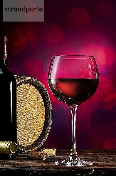 Red wine and wooden barrel on a burgundy bokeh background