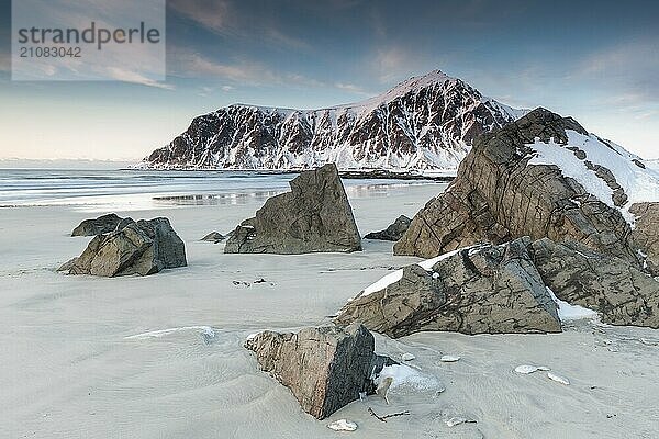 Winter evening mood at Skagsanden  stones on the beach near Flakstad  Flakstadøy  Lofoten  Nordland  Norway  Europe