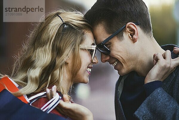 Picture showing young couple shopping in the city. Portrait of a couple with shopping bags in the city.People  sale  love and happiness concept