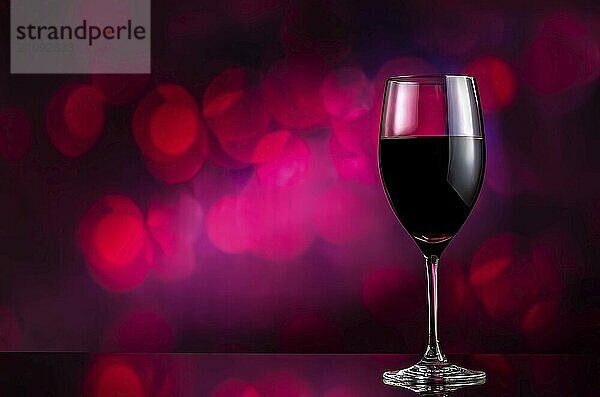 Red wine in wineglass on bokeh background