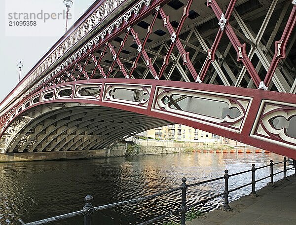 The historic 19th century crown point bridge crossing the river aire in leeds