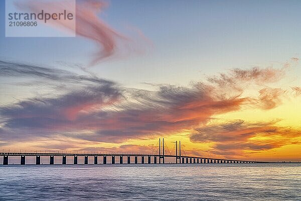 The famous Öresund Bridge between Denmark and Sweden after a spectacular sunset