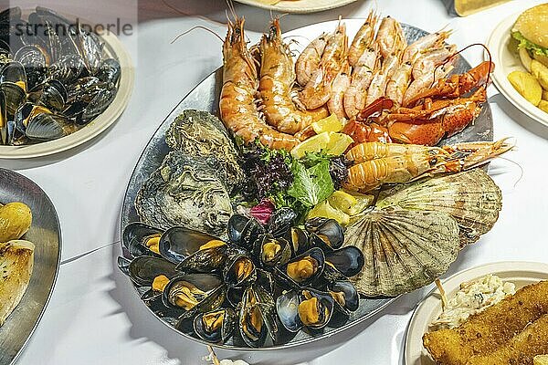 Plate of seafood for sale at a market in Bergen  Norway  Europe