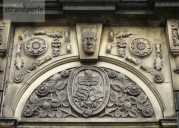 Sowerby bridge  west yorkshire  united kingdom  16 july 2019: carved heraldic logo over the former lancashire and yorkshire bank in sowerby bridge