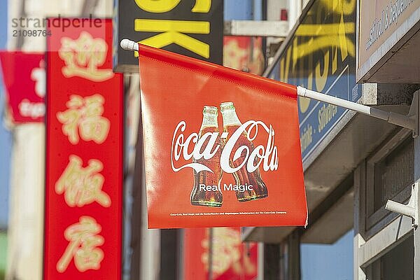 Coca Cola flag in front of a Chinese restaurant  Hamburg  Germany  Europe