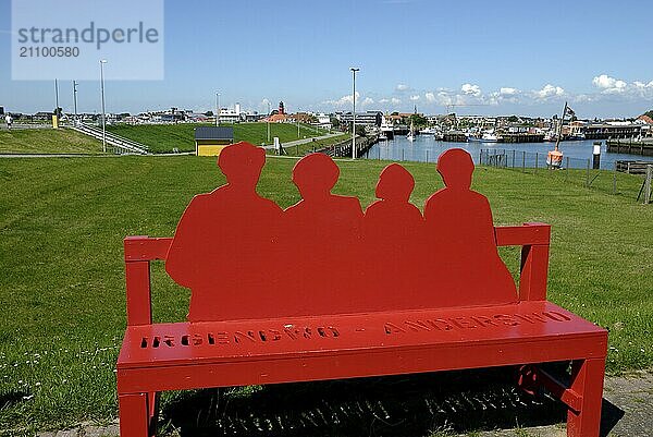 Red bench at the harbour in Büsum  Schleswig-Holstein  Germany  Europe