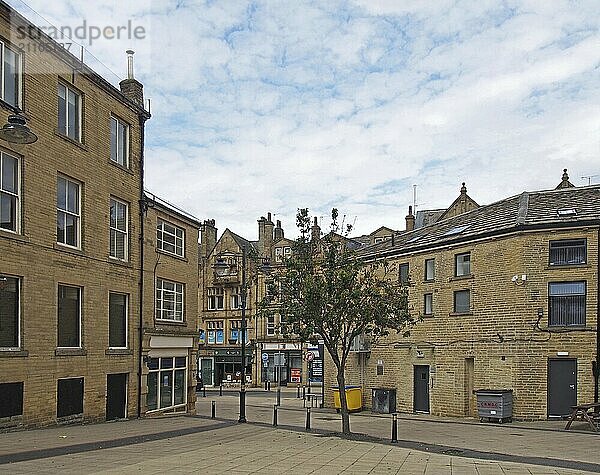 Bradford  west yorkshire  united kingdom  19 june 2019: old buildings and shops in oastler square in bradford west yorkshire