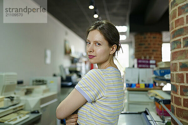 Confident woman in a printing shop