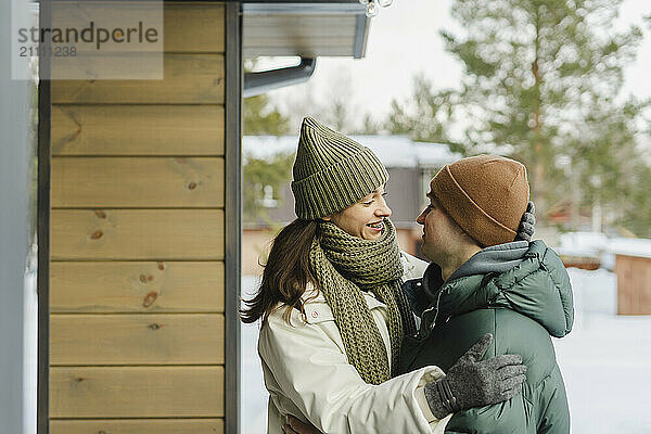 Romantic couple wearing warm clothes in winter