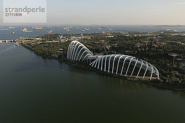 Aerial view of iconic domes and waterfront in Singapore.