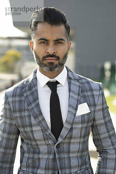 Businessman in suit outside office