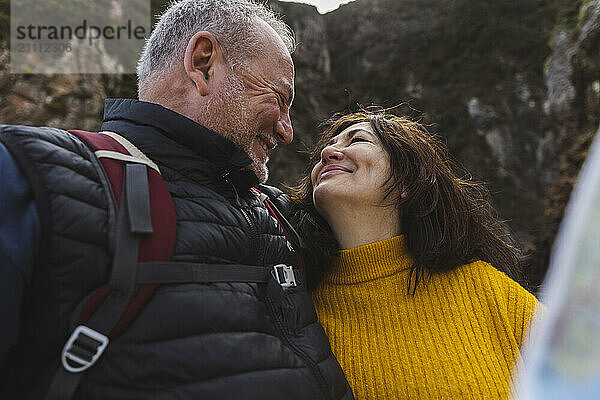 Happy senior couple on vacation at beach