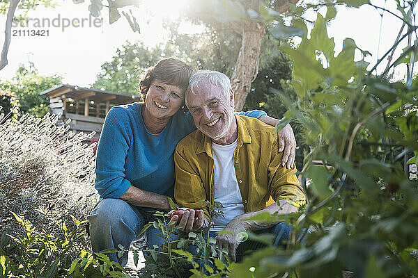 Happy couple at back yard on sunny day