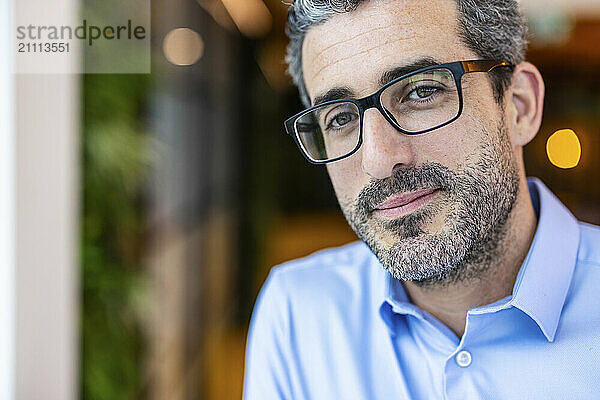 Businessman with eyeglasses at co working space