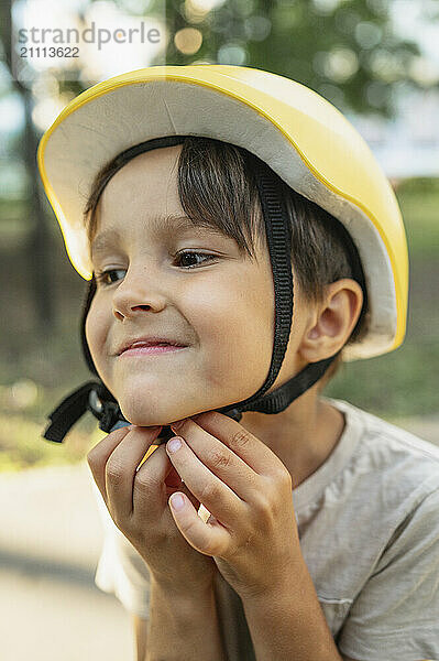 Cute boy wearing helmet