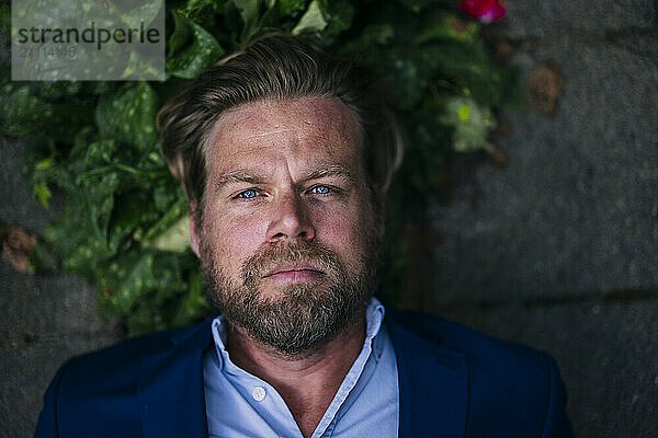 Mature businessman with blue eyes