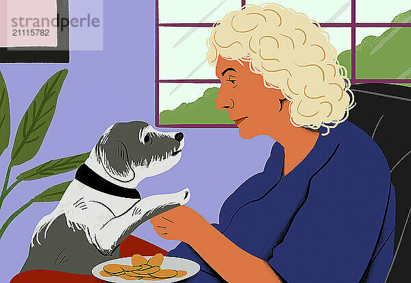 A curly-haired woman in blue shares a moment with a grey and white dog  possibly begging for treats at a table.