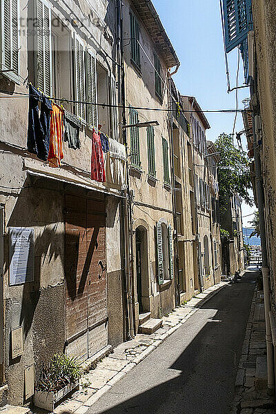 France. Bouches Du Rhone. La Ciotat. Rue Henri Diffonty  typical with laundry drying in the windows