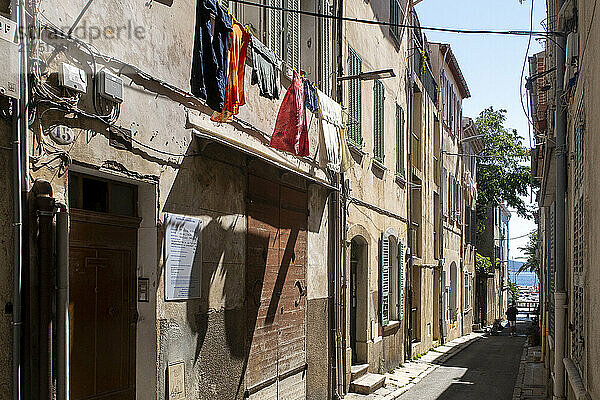 France. Bouches Du Rhone. La Ciotat. Rue Henri Diffonty  typical with laundry drying in the windows