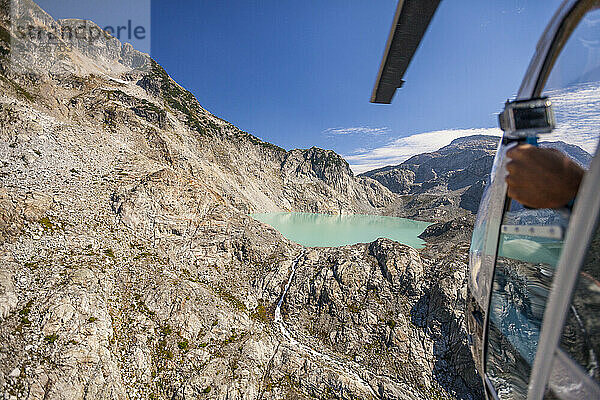 Lake in mountains seen from helicopter