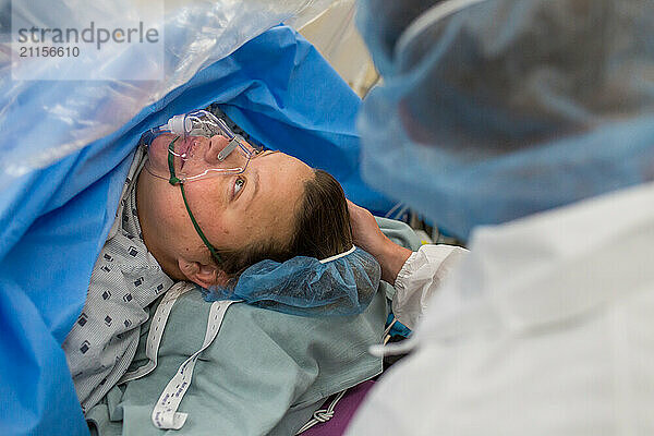 Dad Strokes Mom's Hair While She Waits for C-Section