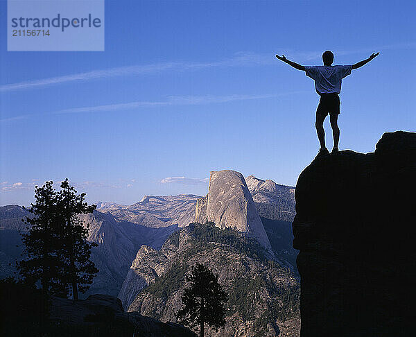 Hiker Overlooking Half Dome  Yosemite National Park  California  USA