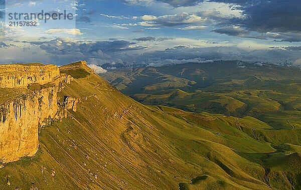 Aerial view of plateau Bermamyt and hills at sunset  North Caucasus mountains  Russia  Europe