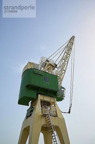 Green harbour crane in front of a blue sky  Sandnes  Fylke Rogaland  Norway  Europe