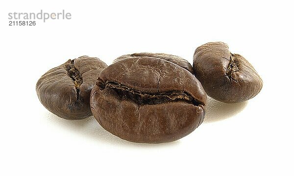 Arabica coffee beans close up isolated on white background