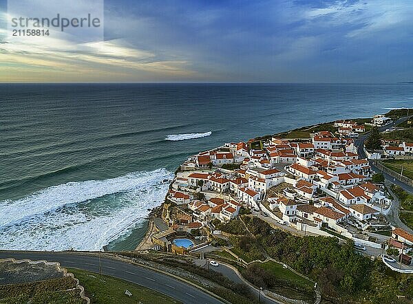 Aerial view of beautiful coastal town Azenhas do Mar in Portugal. The picturesque town on the Atlantic ocean at sunset