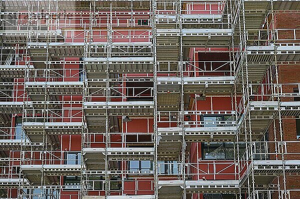 Multi-storey building under construction  surrounded by scaffolding in daylight  Sandnes  Fylke Rogaland  Norway  Europe