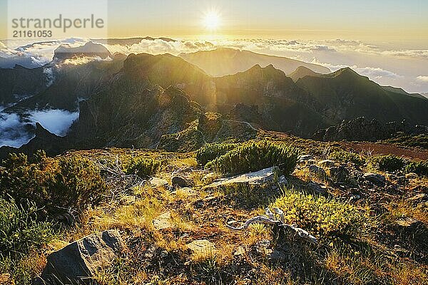 View of mountains over clouds from Pico Ruivo on sunset. Madeira island  Portugal  Europe