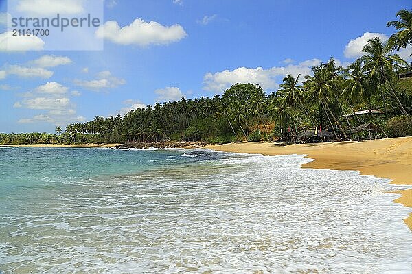 Beautiful tropical beach landscape with clouds