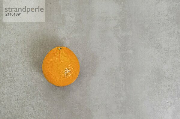 Great concept of healthy eating  orange in gray background. With copy space