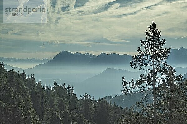 Aerial view of smoky mountains under mist in the morning. Amazing nature scenery in Dolomites  Italy. Tourism and travel concept