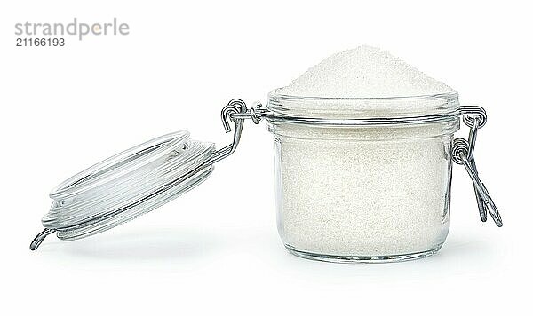 Sugar in glass jar isolated on a white background