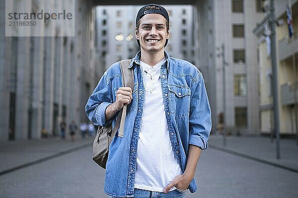 Background on the street while waiting his colleagues. Businessman wearing casual white shirt and spectacles. People