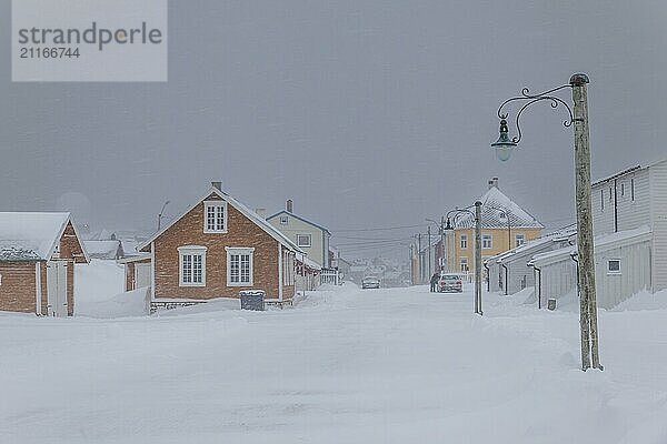 Houses  road  snow  wind  snowstorm  Vardo  Varanger Peninsula  Norway  Europe