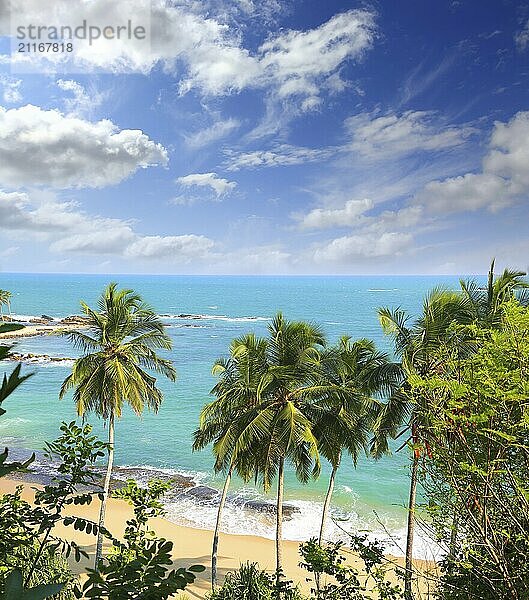 Beautiful tropical beach landscape with turquoise sea and clouds