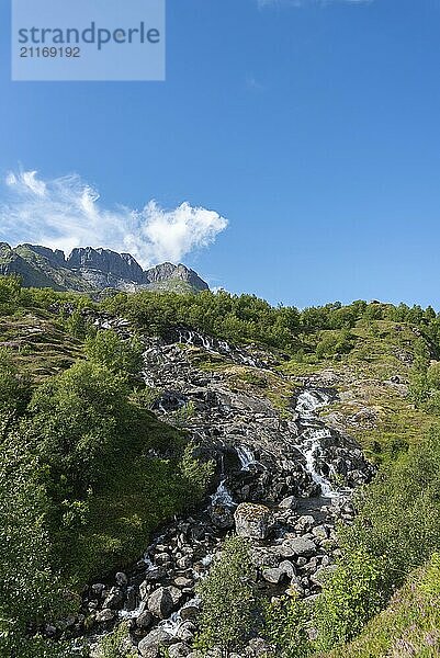 Landscape with the Sorvagen waterfall at Munkebu-stig  Sorvagen  Lofoten  Norway  Europe