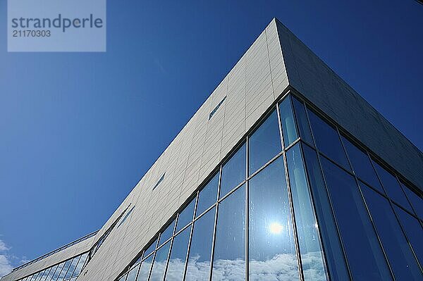 Modern building More og Romsdal Art Centre with glass front and reflecting blue sky  Molde  Romsdal  Norway  Europe