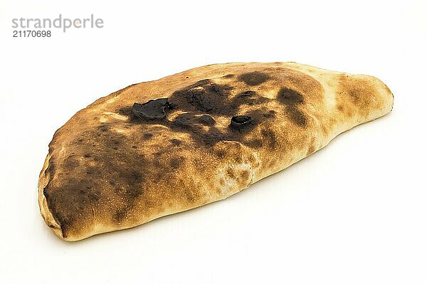 Baked in calzone  closed type of pizza which is folded in half on a white background