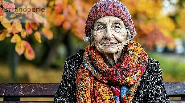 Elderly woman with colourful hat and scarf sits on a bench in front of an autumnal backdrop  generated with AI  AI generated