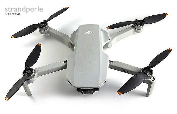 Dji mavic mini 2  the smallest drone launched by DJI. Drone weighing only 249 g. Isolated on white background. Vinnytsia  Ukraine  January 9  2022  Europe