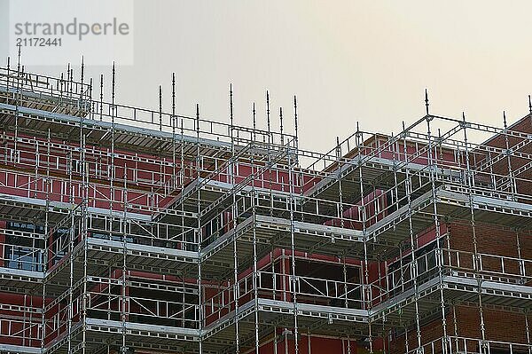 Multi-storey building under construction  surrounded by scaffolding in daylight  Sandnes  Fylke Rogaland  Norway  Europe